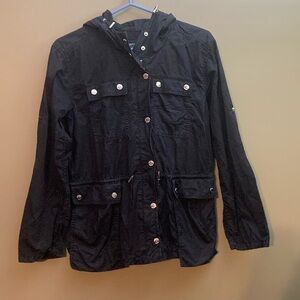 Michael Kors black cargo utility jacket with hood and cinchable waist.